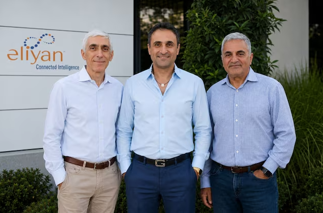 Eliyan founders standing outside the company's office after securing $145 million in Series C funding and achieving unicorn status.