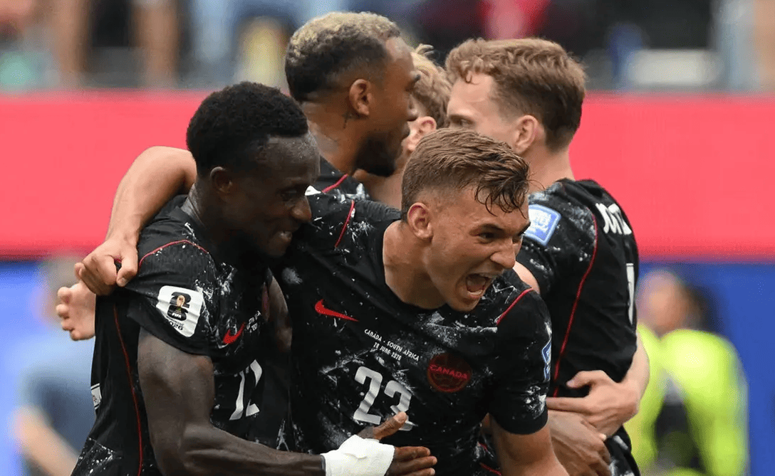 Canada players celebrate their 1-0 victory over South Africa after a late goal secured qualification for the FIFA World Cup 2026 Round of 16.