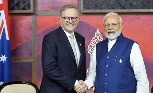 Prime Minister Narendra Modi shakes hands with Australian Prime Minister Anthony Albanese during the India-Australia Annual Leaders' Summit discussing trade, investment, and strategic cooperation.