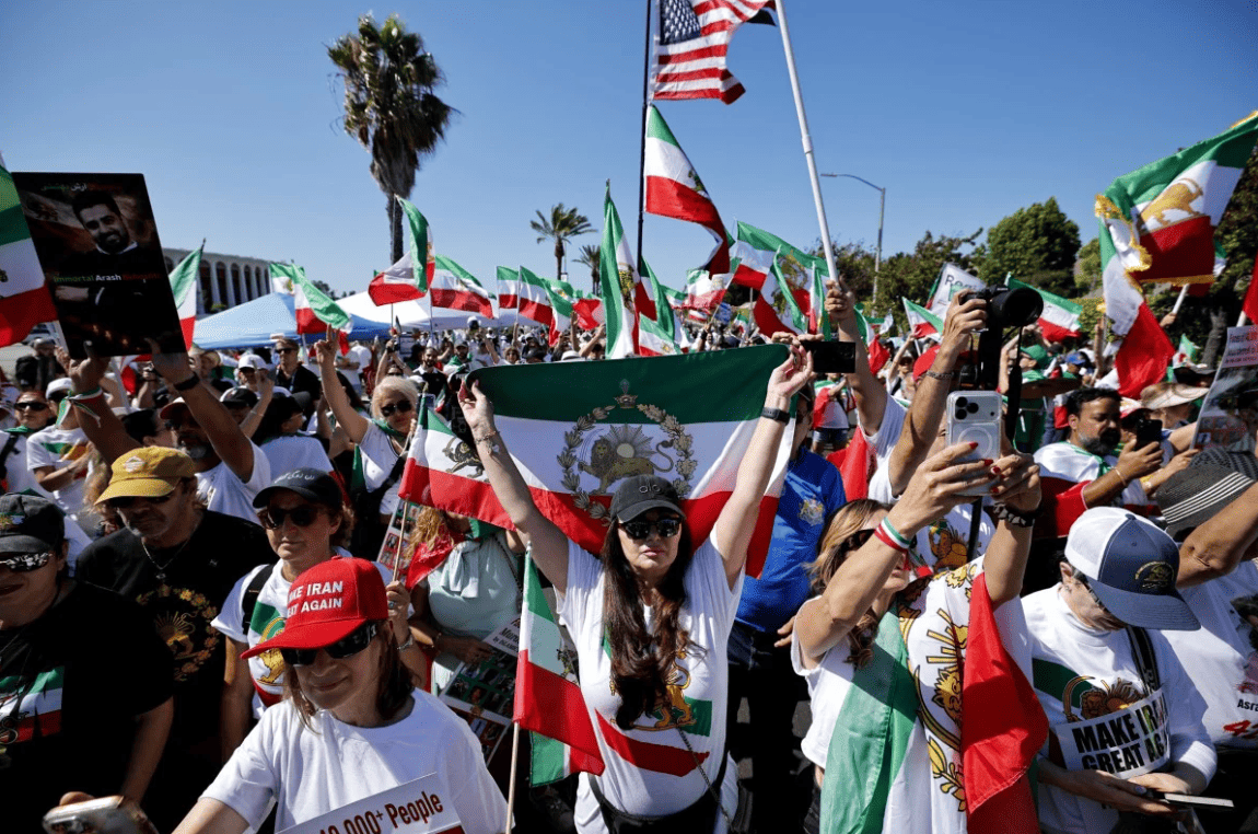 Iranian Americans protest Iran national team outside SoFi Stadium during the 2026 FIFA World Cup match in Los Angeles.