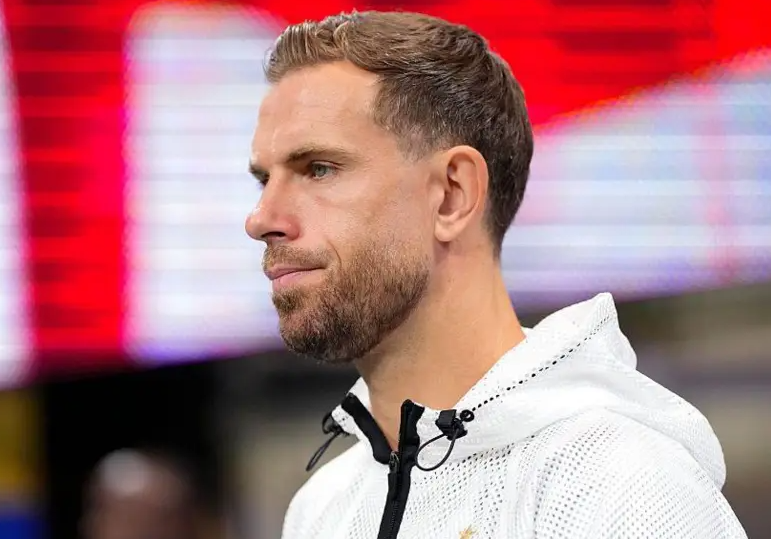 Jordan Henderson in England training gear before suffering a wrist injury during World Cup celebrations.