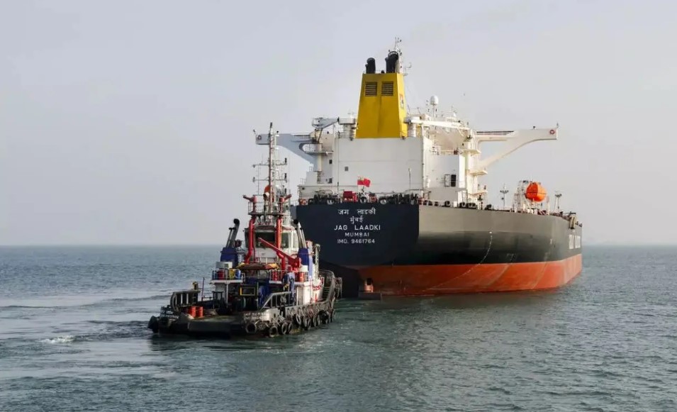Indian Navy warship escorting an oil tanker during Operation Urja Suraksha near the Strait of Hormuz to secure India's energy supply routes